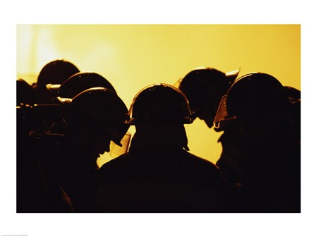 Rear view of a group of firefighters looking down art print