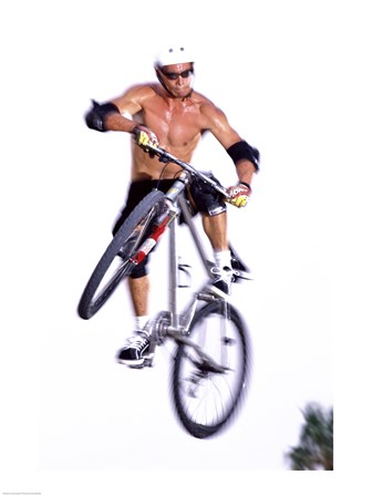 Young man on a bicycle in mid-air art print