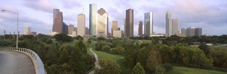 Skyscrapers against cloudy sky, Houston, Texas by Panoramic Images art print