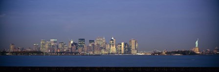 New York Waterfront at Night with the Statue of Liberty by Panoramic Images art print