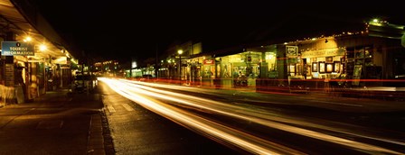 Streaks of lights on the road in a city at night, Lahaina, Maui, Hawaii, USA by Panoramic Images art print