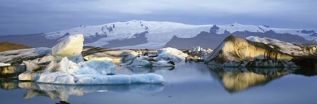 Icebergs on Jokulsarlon lagoon, water reflection, Vatnajokull Glacier, Iceland. by Panoramic Images art print