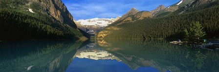 Reflection of mountains in water, Lake Louise, Banff National Park, Alberta, Canada by Panoramic Images art print