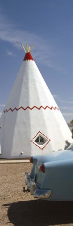 Car with a teepee in the background, Wigwam Motel, Route 66, Holbrook, Navajo County, Arizona, USA by Panoramic Images art print
