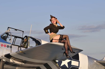 Pin-up girl sitting on the wing of a P-51 Mustang by Christian Kieffer/Stocktrek Images art print