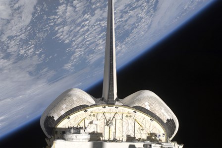 A partial view of Space Shuttle Endeavour Backdropped by Earth&#39;s horizon by Stocktrek Images art print