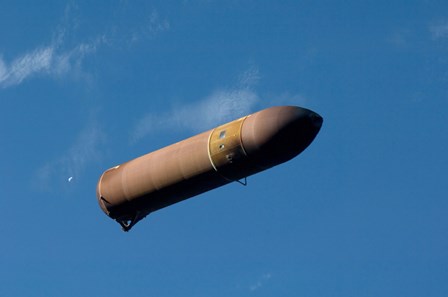 An External Fuel Tank Backdropped by a Blue and White Part of Earth by Stocktrek Images art print