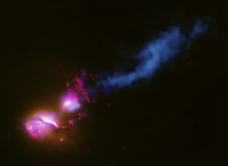 A Powerful Jet from a Supermassive Black Hole is Blasting a nearby Galaxy by Stocktrek Images art print